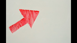 Red Arrow Drawn on Whiteboard Space for Text