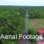 Aerial Footage of Small Road with Cars, Sheds and Palm Trees