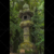 Japanese stone temple lantern, Tōrō, in forest. Kyoto, Japan.