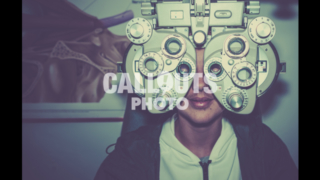 Young Teenage Boy Going Through Eye Exam, Ophthalmic Testing Device, Vintage Styled
